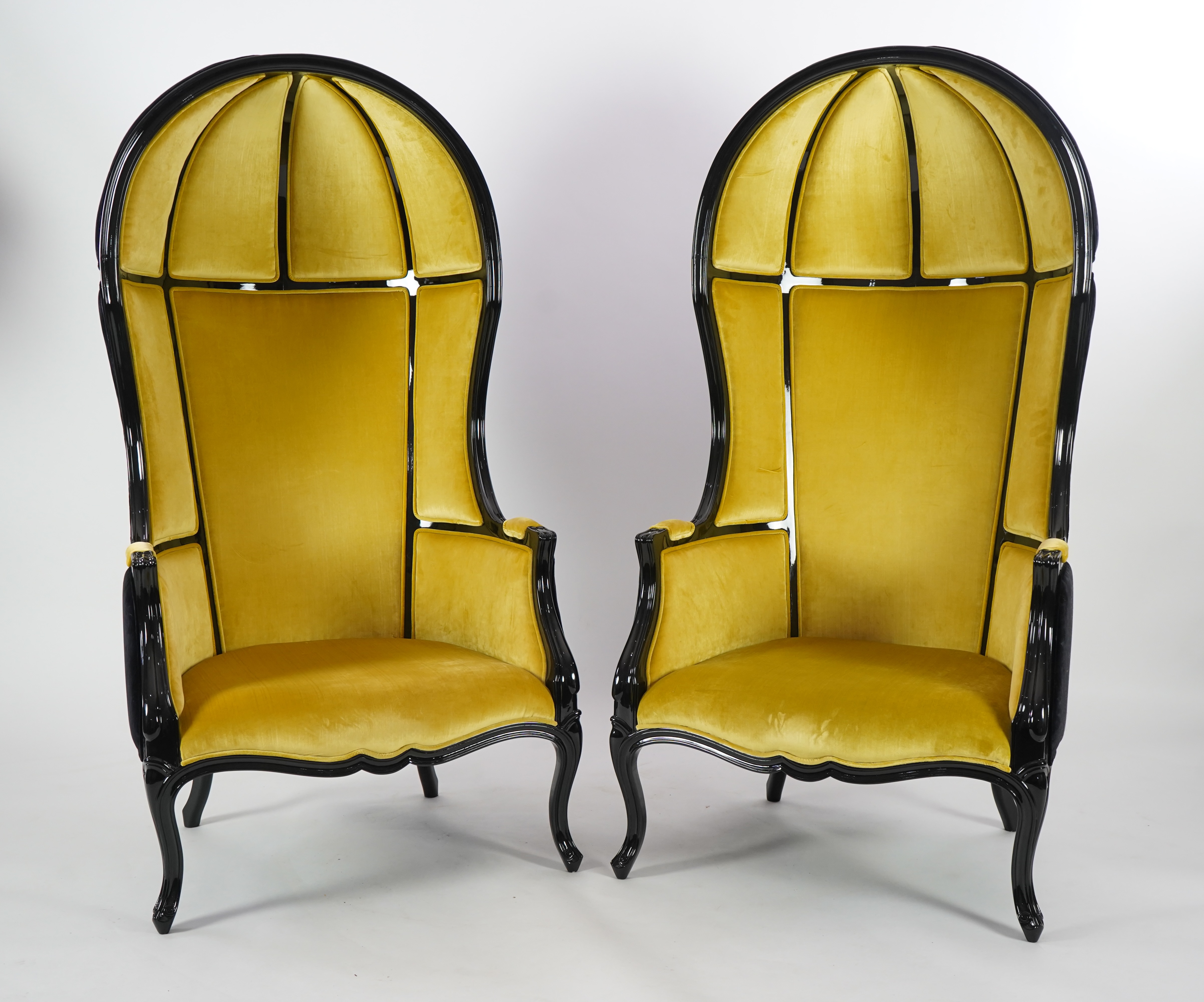 A pair of Namib ebonised and sand coloured satin cotton fabric lounger armchairs, by Brabbu, width 77cm, depth 75cm, height 160cm. Condition - good